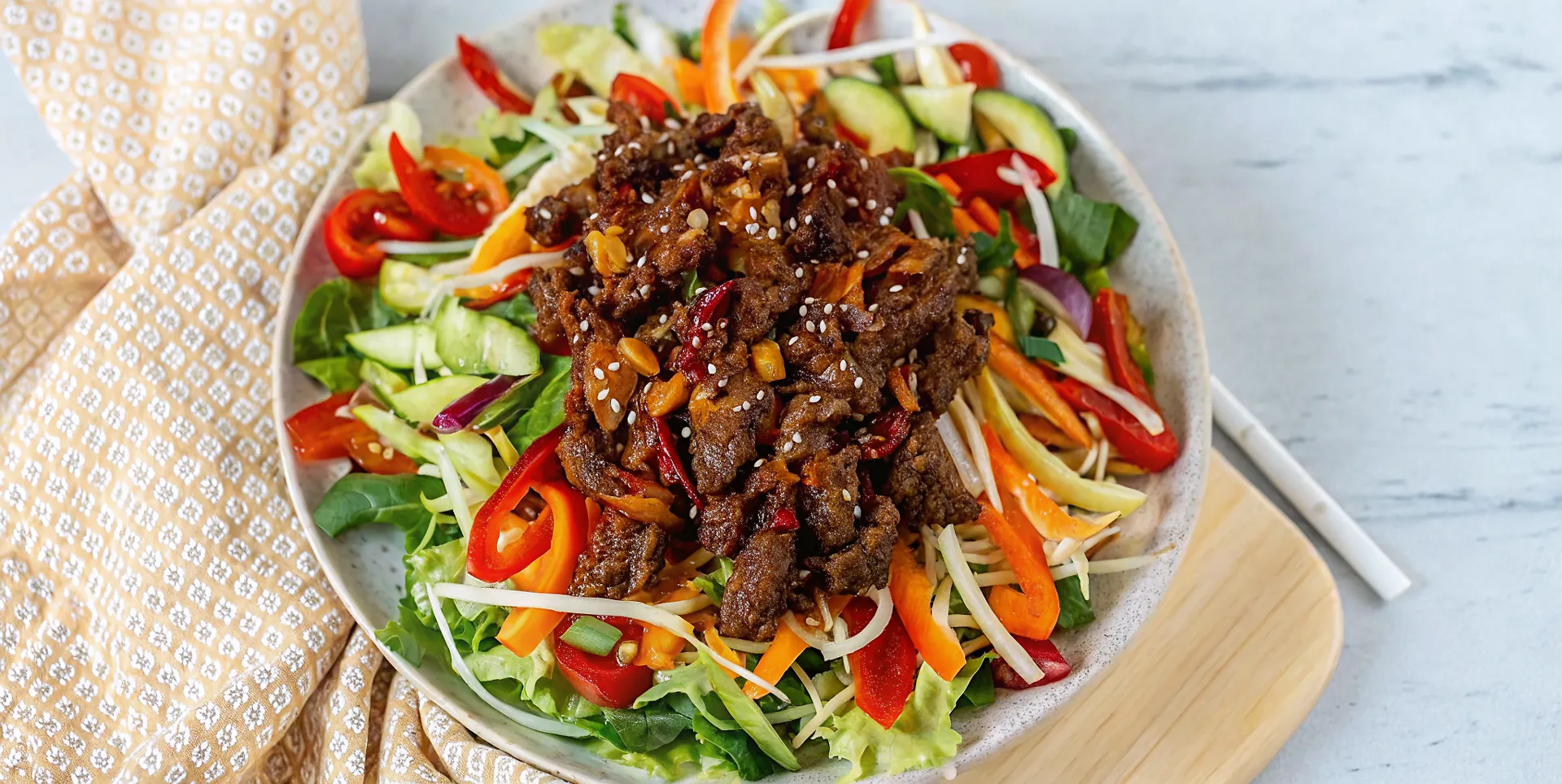 Perfectly seared Crispy Chilli Beef Salad served professional style