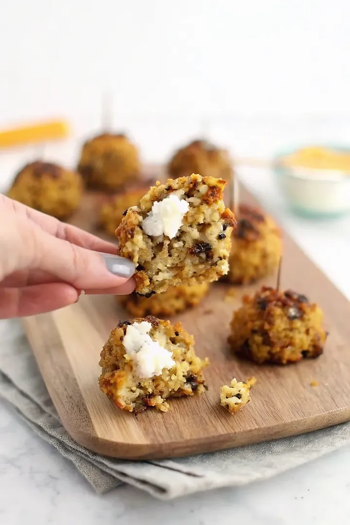 Perfectly seared Goat Cheese Stuffed Toasted Plantain Rice Balls served professional style