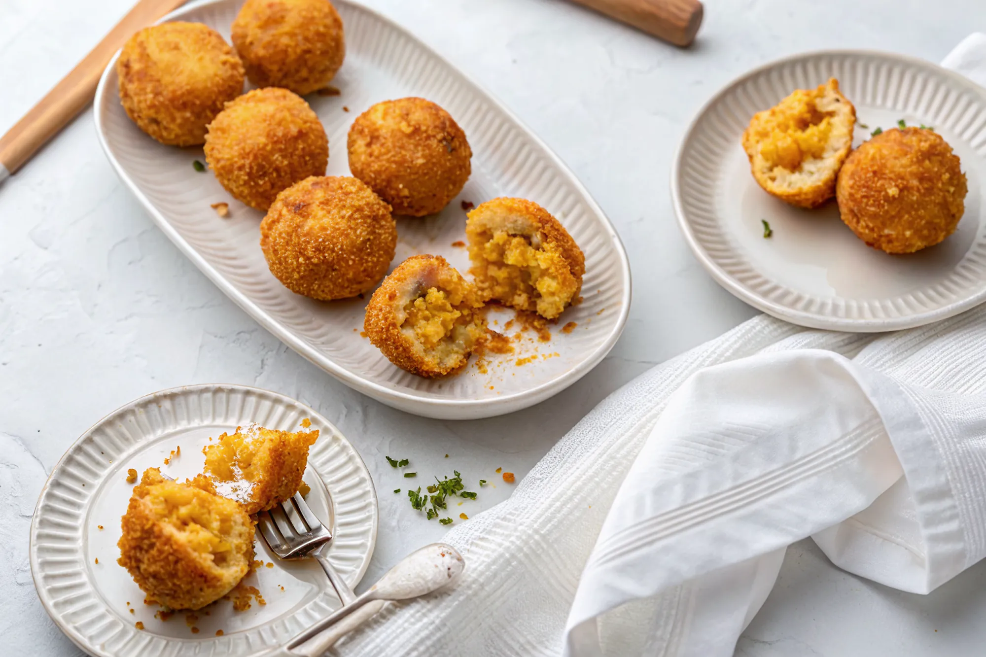 Perfectly seared Lentil Curry Stuffed Arancini served professional style