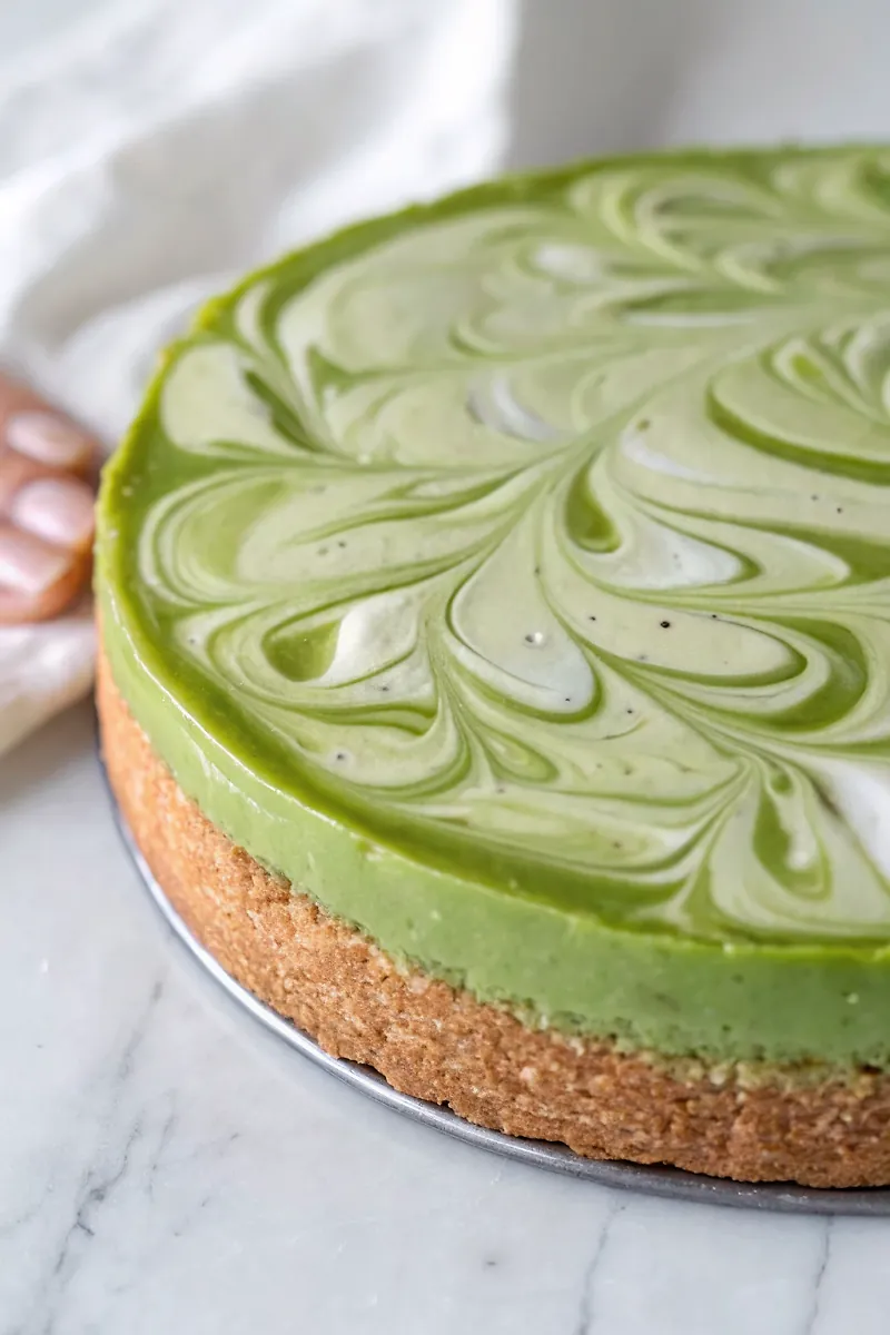 Perfectly seared Matcha Cheesecake (Vegan, Paleo, No-Bake) served professional style