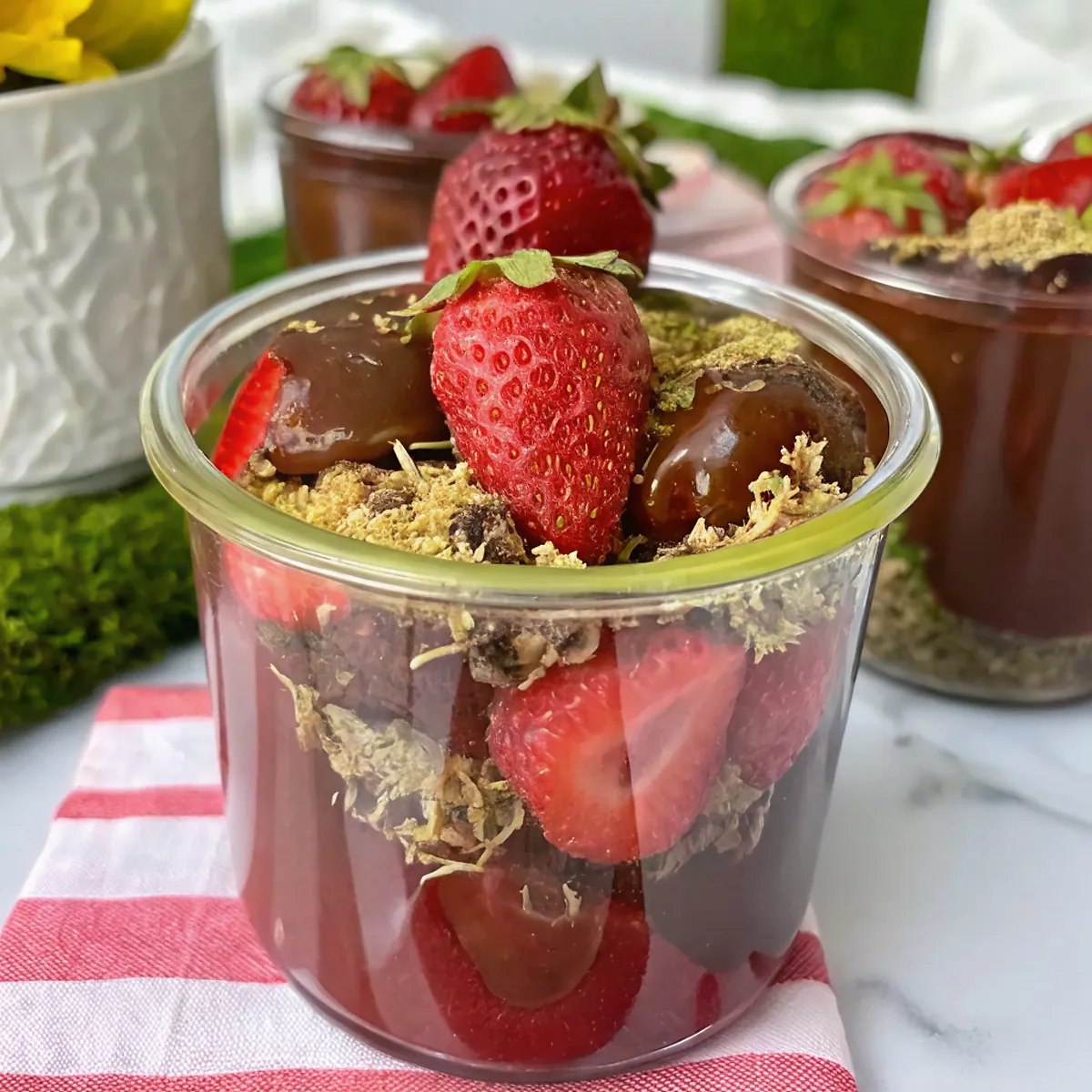 Perfectly seared Dubai Chocolate Strawberry Cups served professional style