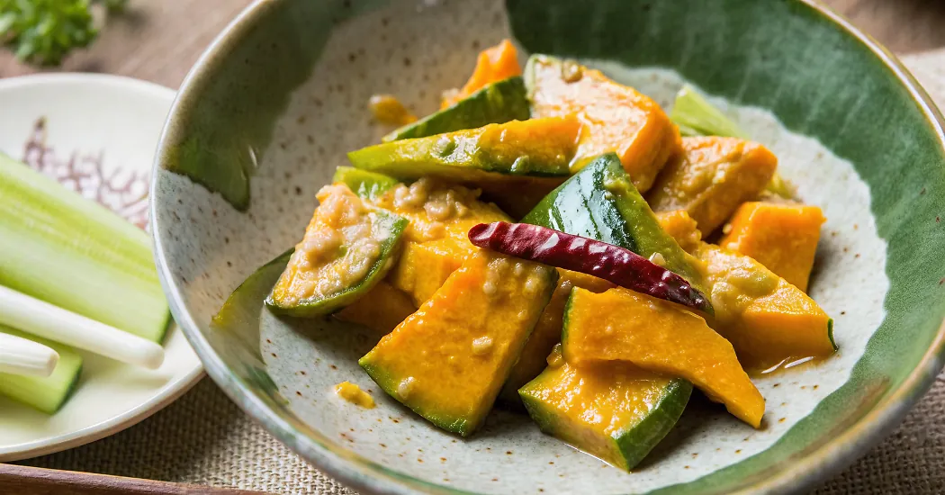 Perfectly seared Sake-Steamed Kabocha Squash With White Miso served professional style